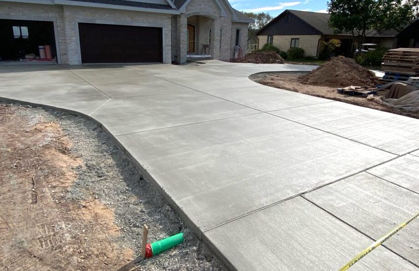 Broom-finish concrete driveway installed by LU Concrete in Inver Grove Heights, MN
